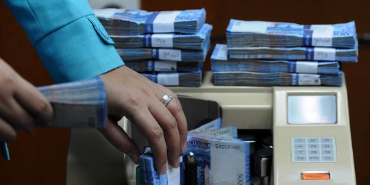 Rupiah Ditutup Melemah Tipis ke Level Rp14.610 per USD