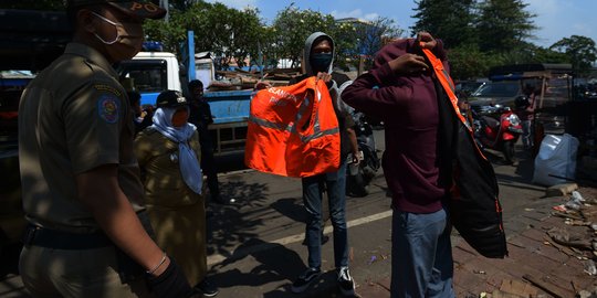 41.693 Orang Tak Pakai Masker Ditindak Selama PSBB Transisi di DKI