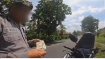 viral polisi minta duit damai rp1 juta ke turis asing