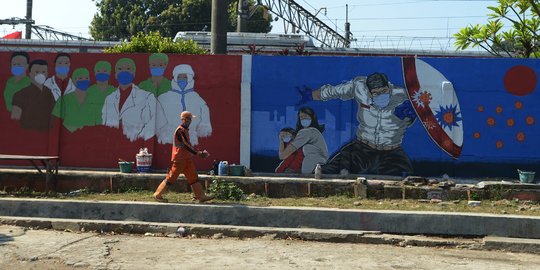 Pesan Mural Covid-19 di Bukit Duri untuk Masyarakat