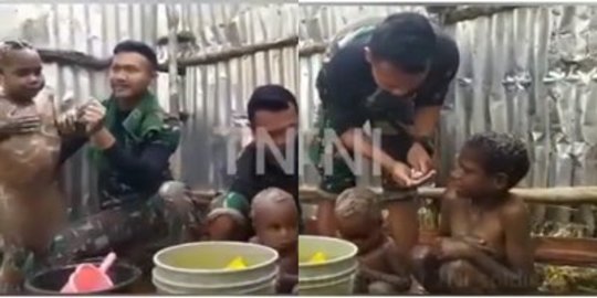 Momen Manis Prajurit TNI Mandikan Bocah Papua di Tengah Beratnya Tugas, Bikin Haru