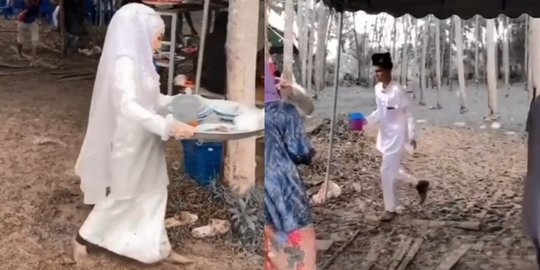 Viral Video Pengantin Bereskan Piring Bekas Tamu di Hari Pernikahannya Sambil Nyeker