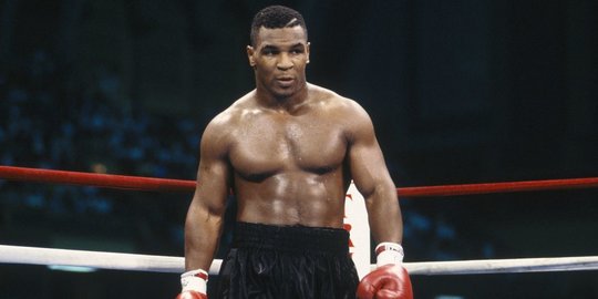 Mike Tyson Tuntaskan Dendam ke Larry Holmes Usai Muhammad Ali Menagih Janji