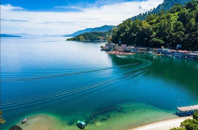 new tourist destinations 4 portraits of the colorful village of three tigahirit on Lake Toba