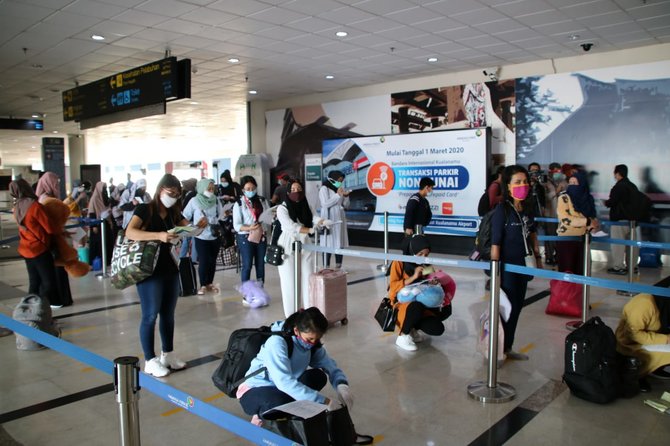 wni pulang dari malaysia di bandara kualanamu