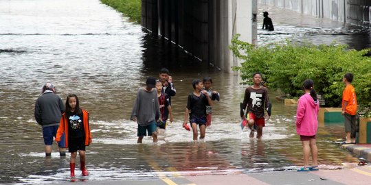 Jakarta yang Dibayang-Bayangi Banjir dan Pandemi Covid-19