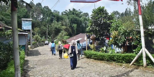 Korban Banjir Bandang di Bogor Mulai Kembali ke Rumah