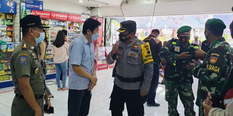 Setahun Melawan Covid 19 Dan Upaya Tni Polri Tegakkan Protokol Kesehatan Merdeka Com