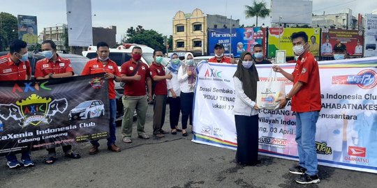 Rayakan HUT ke-17, AXIC Bagi Paket Sembako ke Sopir Ambulan & Penggali Kubur Covid-19