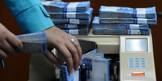 Rupiah Ditutup Melemah Tipis Rp14.450 per USD