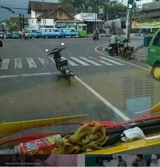 potret viral motor parkir di tengah jalan saat lampu merah jadi sorotan publik