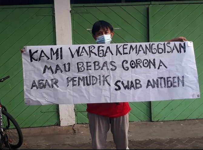 spanduk warga jakarta untuk para pemudik