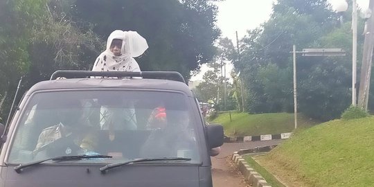 'Pocong Keliling' Sosialisasi Swab Antigen Gratis Bagi Pemudik di Cisauk