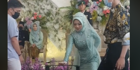 Viral Aksi Pengantin Wanita Patahkan Besi di Hari Pernikahan, Sukses Curi Perhatian