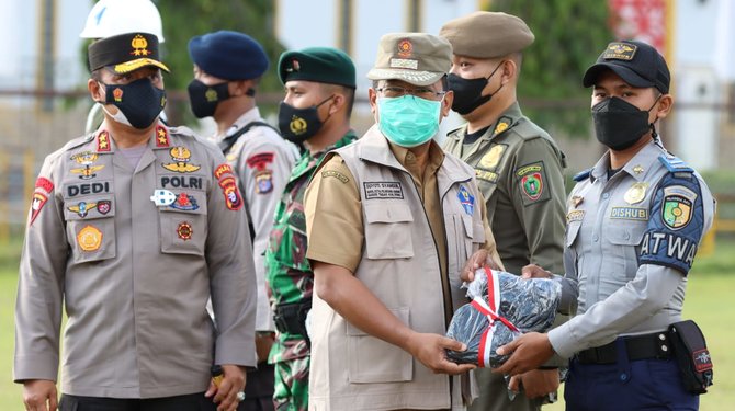 polda kalteng gelar apel operasi yustisi tim pemburu covid 19