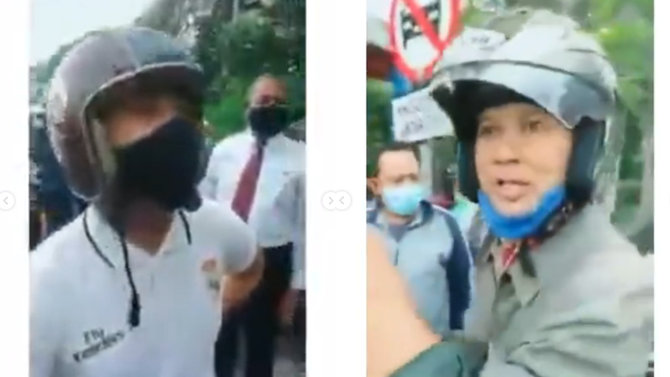 mobil berplat dinas polisi terobos lampu lalin