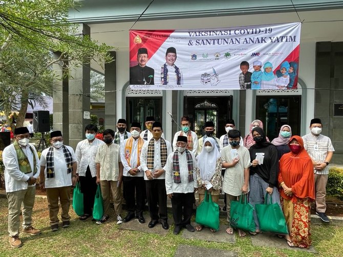 perkumpulan permata mht gelar vaksinasi covid 19 dan santunan anak yatim