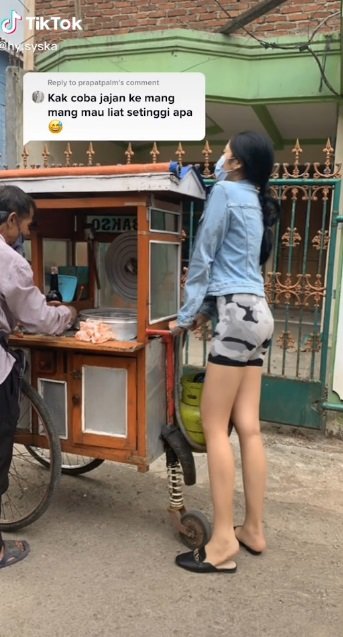 potret wanita tinggi badan