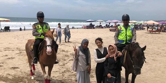 PPKM Level 3, Pantai di Bali Mulai Ramai Dikunjungi Wisatawan