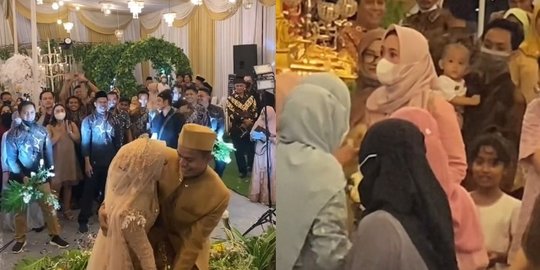 Lagi Asyik Antre Makan, Ibu Ini Kaget Tiba-Tiba Dapat Buket Bunga dari Pengantin