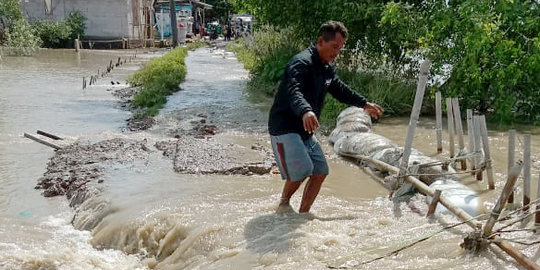 Luapan Sungai Citarum Rendam Pemukiman di Kabupaten Bekasi, Akses Jalan Terputus