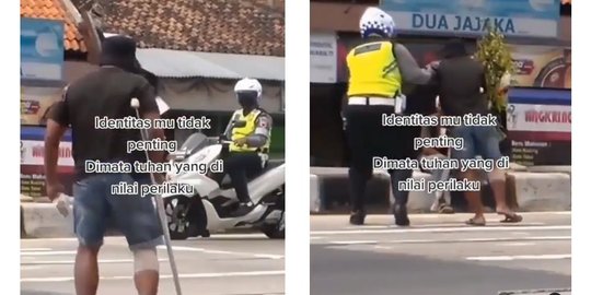 Masya Allah, Polisi Ini Bantu Pria yang Gunakan Tongkat Saat Menyeberang & Terjatuh