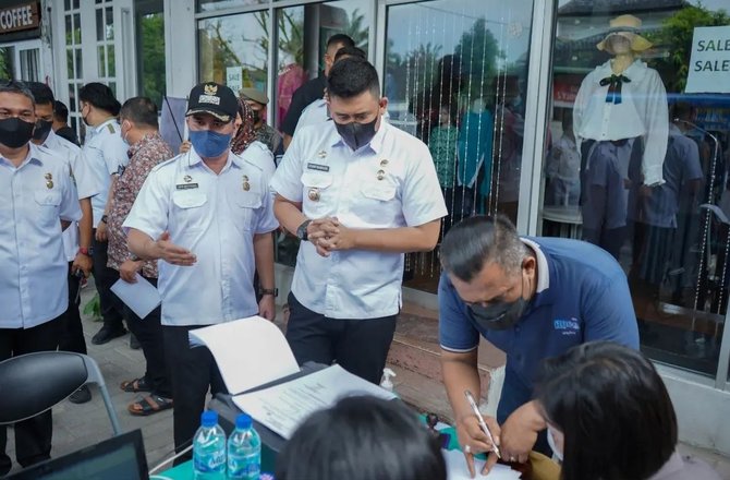 ada layanan go fast e ktp perdana di kota medan begini antusiasme warga