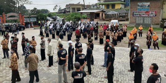 Sambangi Kampung Susu Magetan, Erick Thohir Disambut Spanduk Dukungan Nyapres