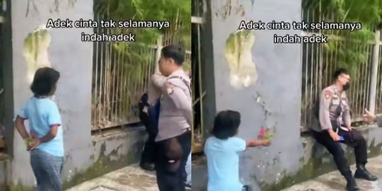 Malu-Malu, Begini Aksi Anak Kecil Berlutut Beri Bunga di Depan Polisi