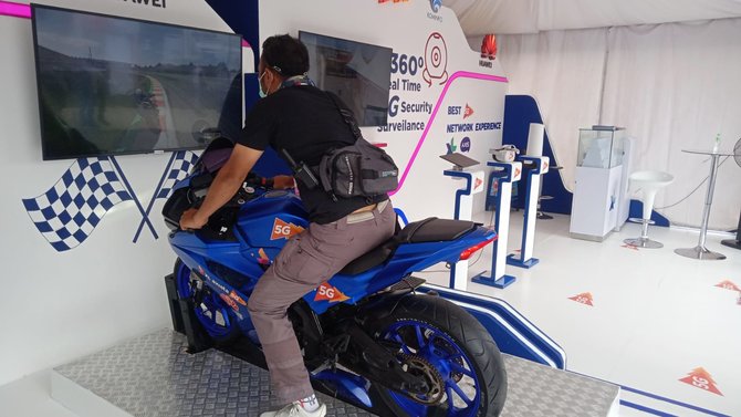 xl axiata hadirkan game simulator motogp di booth sirkuit mandalika seperti apa