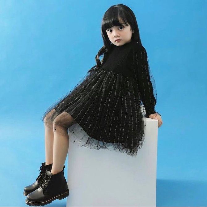 dominique regina tambunan