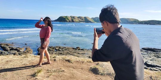 Kisah Fotografer Cilik di Tanjung Aan Lombok, Dibayar Seikhlasnya
