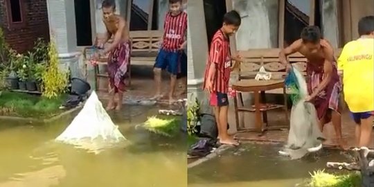 Diduga Akibat Banjir Rob, Pria Ini Panen Ikan Bandeng di Depan Rumah