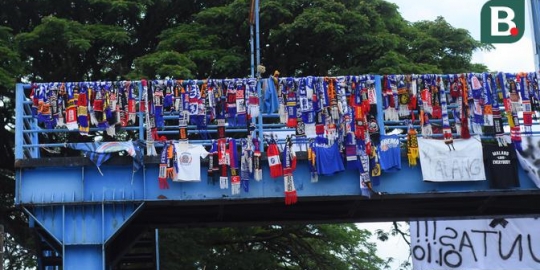 Sampai Jumpa Sepak Bola: Aremania Menggantung Syal, Tuntut Tragedi Kanjuruhan Diusut Tuntas