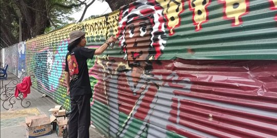 Seniman Mural Kreasikan Karya di Lapangan Merdeka Medan, Bentuk Dukungan Revitalisasi