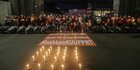 Tuntut RUU PPRT Disahkan, Massa Gelar Aksi Lilin dan Doa Bersama di Gedung DPR