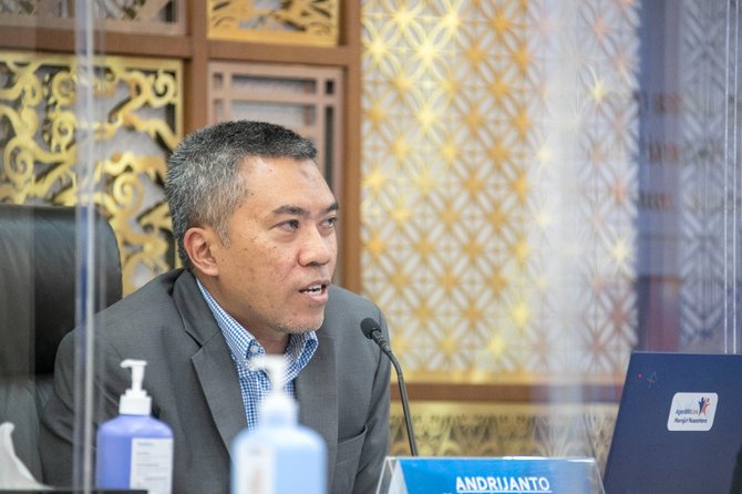 direktur jaringan dan layanan bri andrijanto