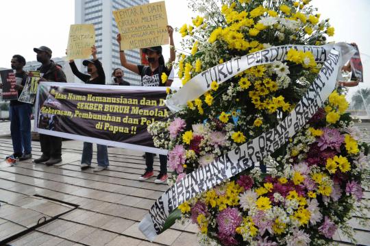 Demo tolak kekerasan di Papua