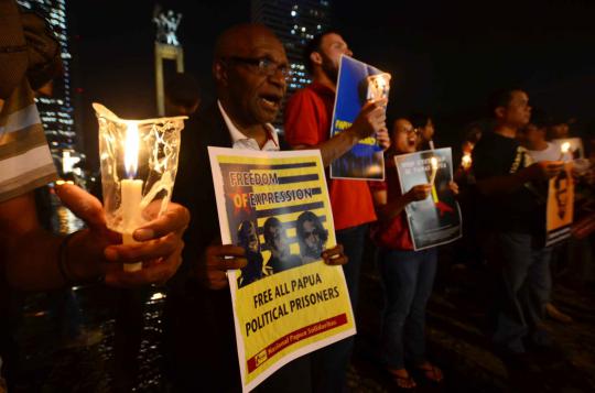 Aksi lilin solidaritas untuk Papua