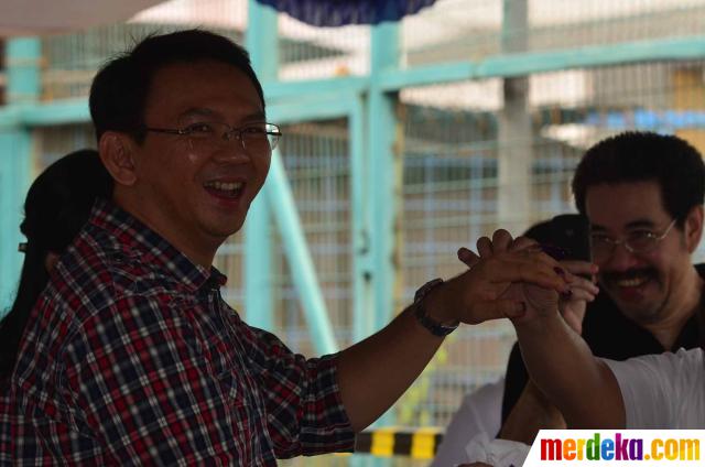 Foto : Bersama istri, Ahok nyoblos di TPS 059 merdeka.com