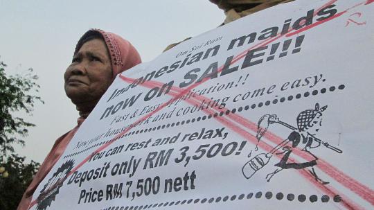 Aksi Migrant Care demo iklan obral TKI di Istana
