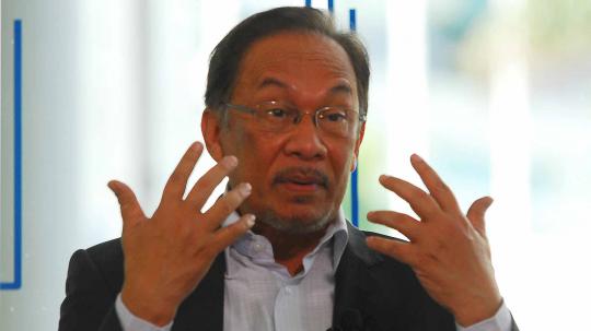 Potret wajah pemimpin oposisi Malaysia Anwar Ibrahim