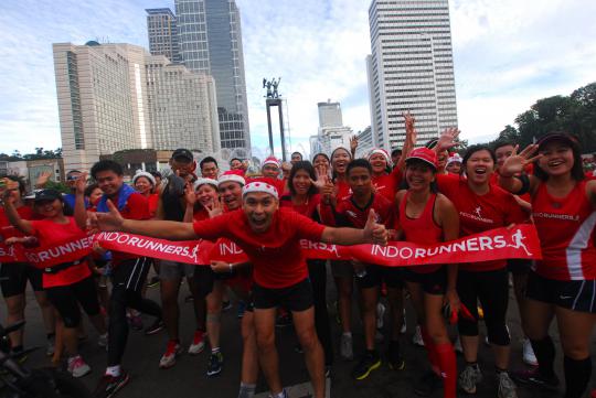 Sambut damai Natal dengan lari pagi bertopi 'Santa Claus'