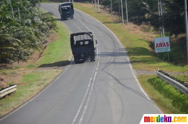 Foto : Kebun kelapa sawit tempat pertempuran Malaysia vs 