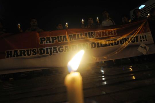 Aksi renungan malam untuk 50 tahun Papua