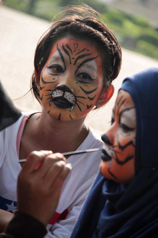Puluhan anak-anak peringati Hari Harimau Sedunia di Monas