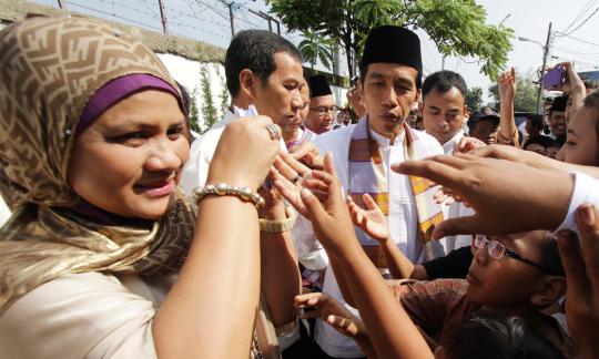 Lebaran hari pertama, Jokowi blusukan di Kampung Deret