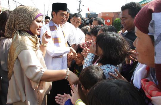 Lebaran hari pertama, Jokowi blusukan di Kampung Deret