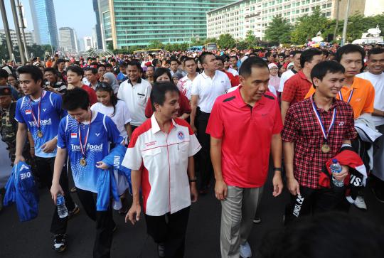 Juara dunia bulu tangkis diarak keliling Jalan Sudirman-Thamrin