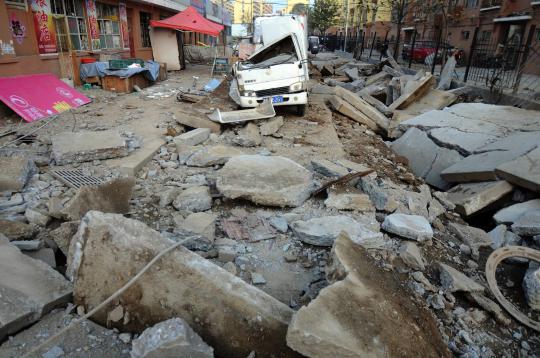 Kerusakan parah akibat ledakan dahsyat pipa Sinopec di China